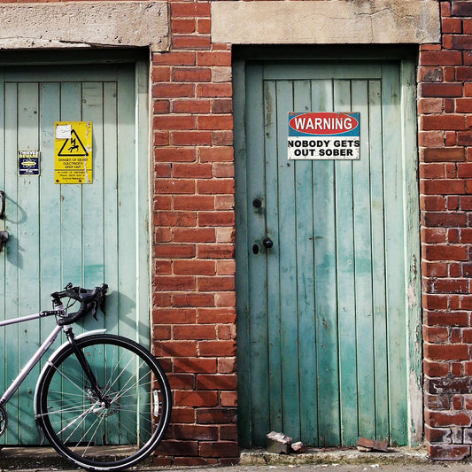 Warning Nobody Gets Out Sober Metal Sign