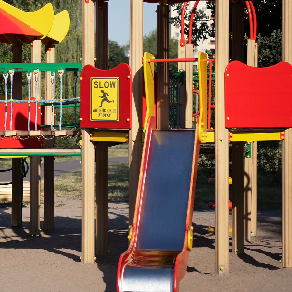 Slow – Autistic Child at Play Safety Sign (Yellow/Black)