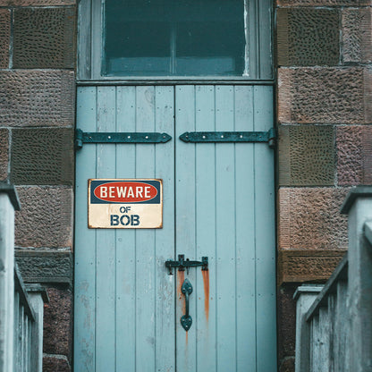 Custom “Beware of Your Name” Metal Sign