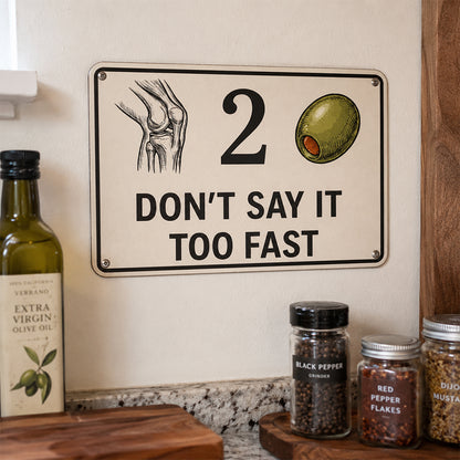 Knee 2 Olive Funny Metal Sign – Don’t Say It Too Fast Wall Decor