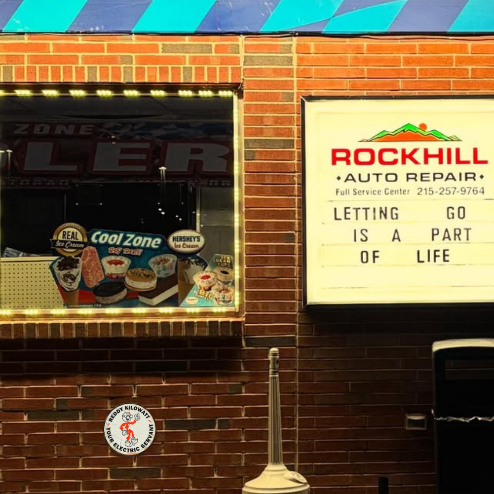 Reddy Kilowatt Round Metal Sign – Vintage Electric Ad