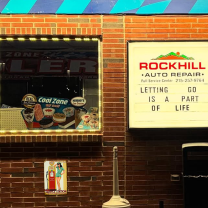 Bettie’s Service Station Pin-Up Tin Sign