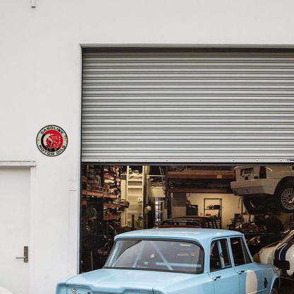 Vintage “Gasoline Motor Oils” Round Tin Sign